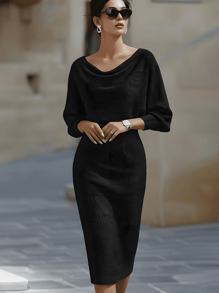 Ladies' round neck midi dress, an elegant and comfortable choice for various occasions.