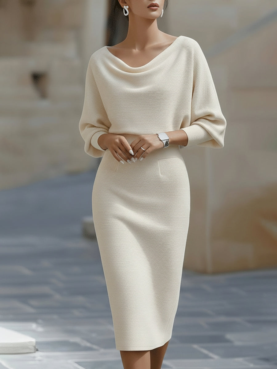 Elegant women's midi dress, round neck, batwing sleeves, a comfortable and stylish option.