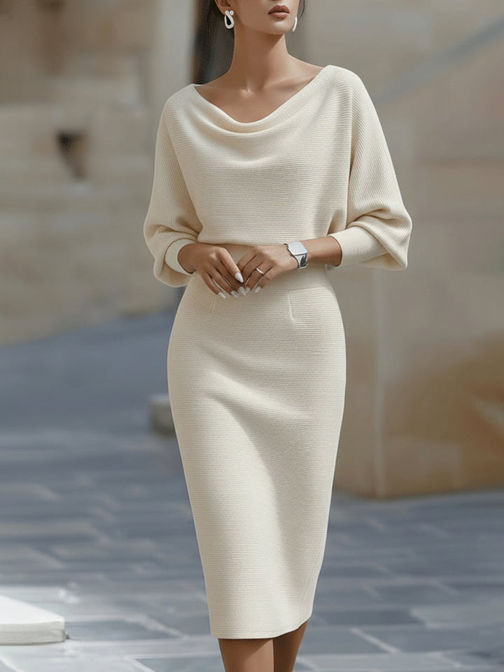 Elegant women's midi dress, round neck, batwing sleeves, a comfortable and stylish option.