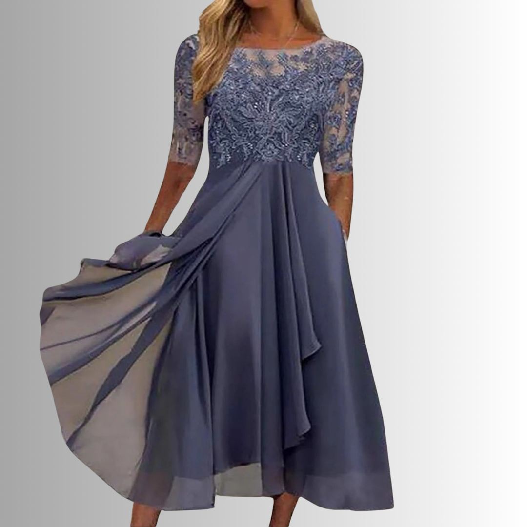Women's elegant A-line midi dress with a sophisticated lace top, half sleeves, and a graceful flowing skirt.
