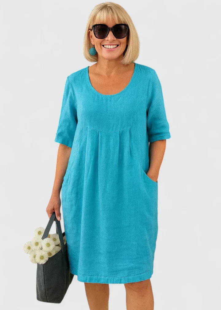 Versatile women's elegant summer midi dress. Half sleeves, scoop neck design for casual or everyday wear.