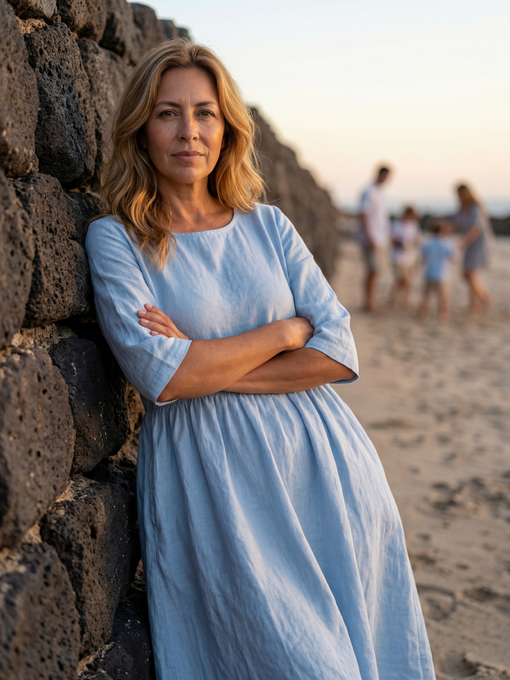 Versatile women's midi dress with pockets, round neck, & half sleeves. Ideal for casual spring & summer wear with comfort.