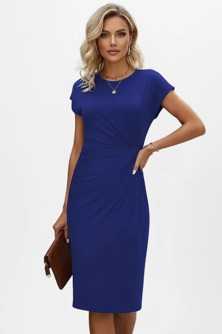 Women's elegant midi dress with flattering ruched waist, cap sleeves & round neck. Comfortable style.