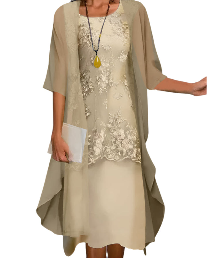 Chic women's midi dress featuring sheer sleeves & flowing silhouette, ideal for parties & sophisticated wear.