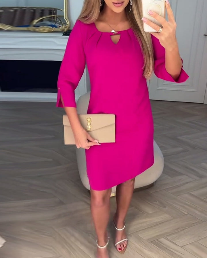 Pink elegant midi dress for women, featuring chic cutout details. Ideal party or formal occasion wear.