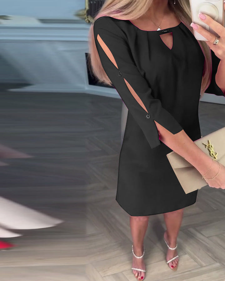 Women's elegant midi dress with captivating cutout detail, suitable for formal and party wear.