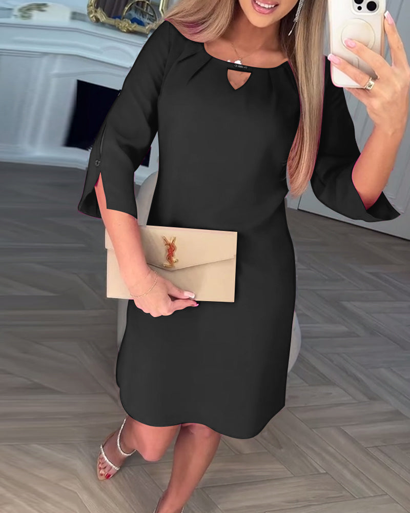 Stylish elegant women's midi dress with modern cutout features, perfect for evening and occasion wear.