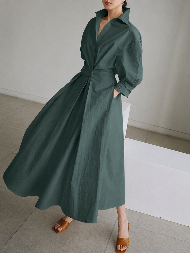 Classic women's elegant midi shirt dress with button details, perfect for spring and summer day looks.