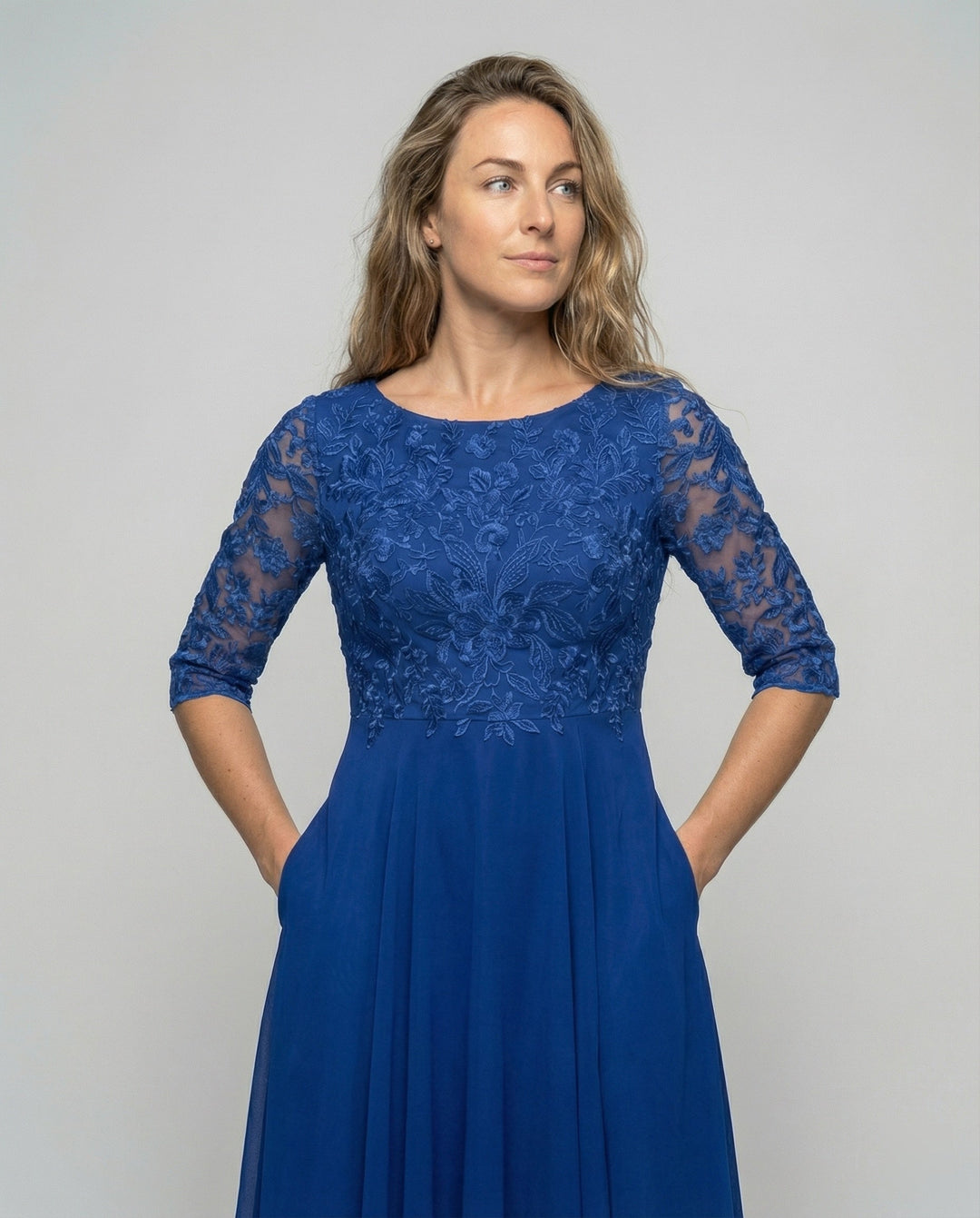 Elegant women's midi dress with embroidered details, ideal for wedding guests and formal parties.