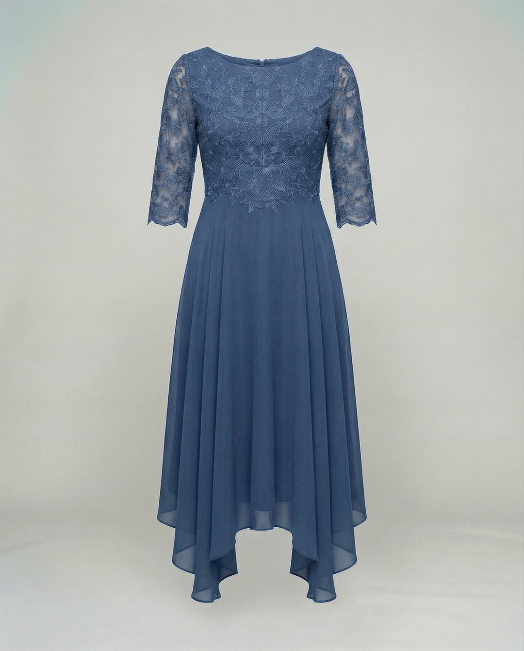 Flowy embroidered midi dress for women, perfect as a comfortable wedding guest outfit.