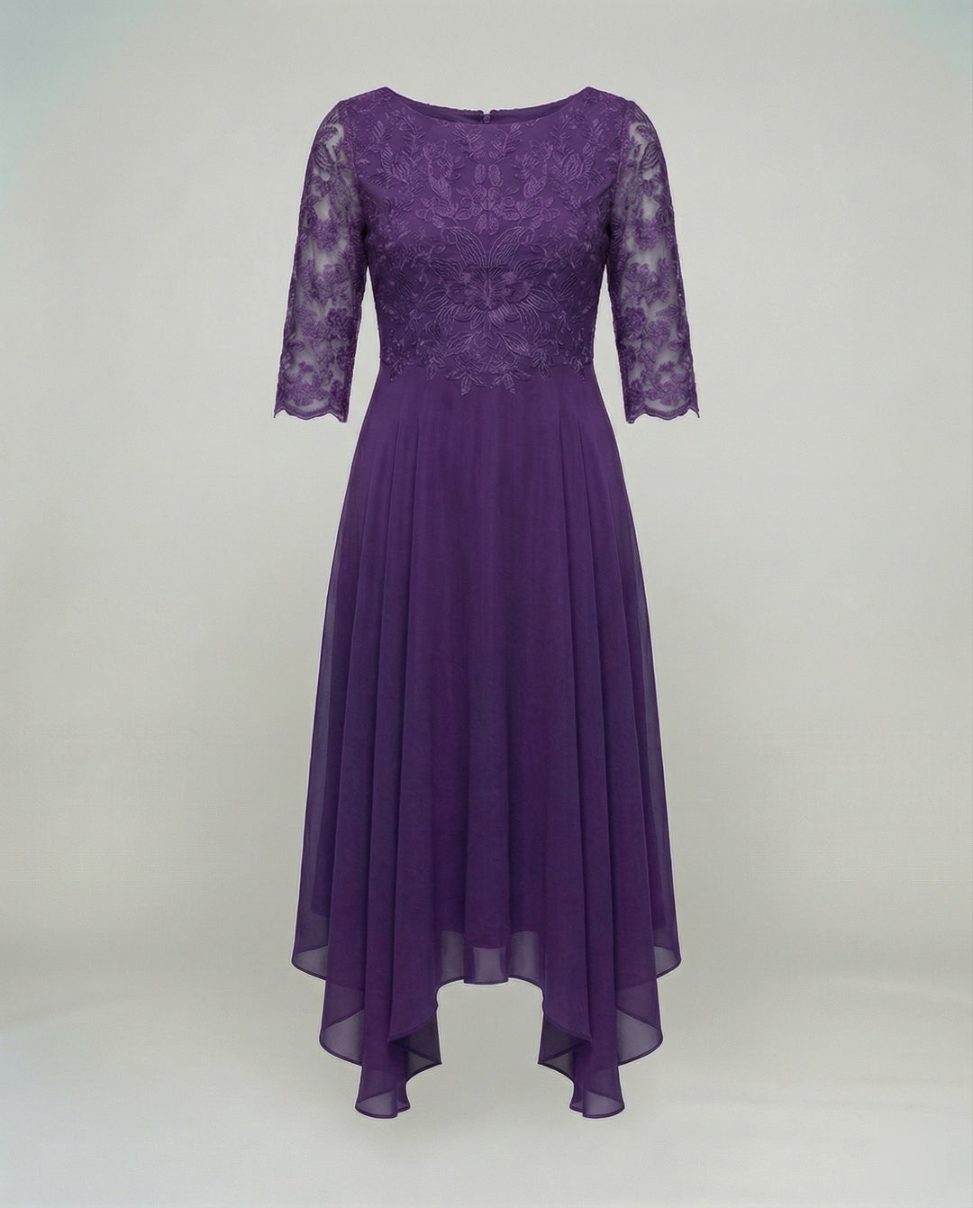 Women's elegant party dress, a beautiful flowy midi style suitable for wedding guests.