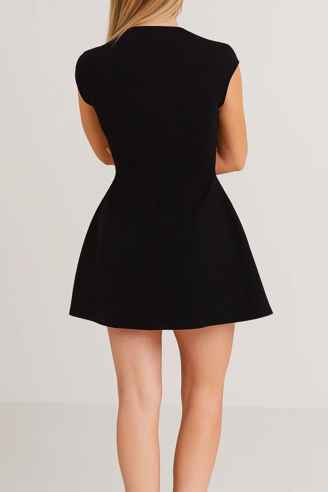 Modern A-line mini dress for women, featuring an elegant stand-up collar. A minimalist and chic summer staple.