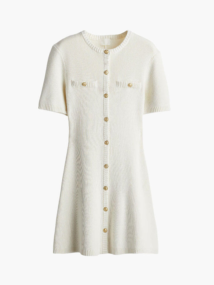 Chic fitted women's mini dress with stylish gold button accents, ideal for versatile year-round fashion.