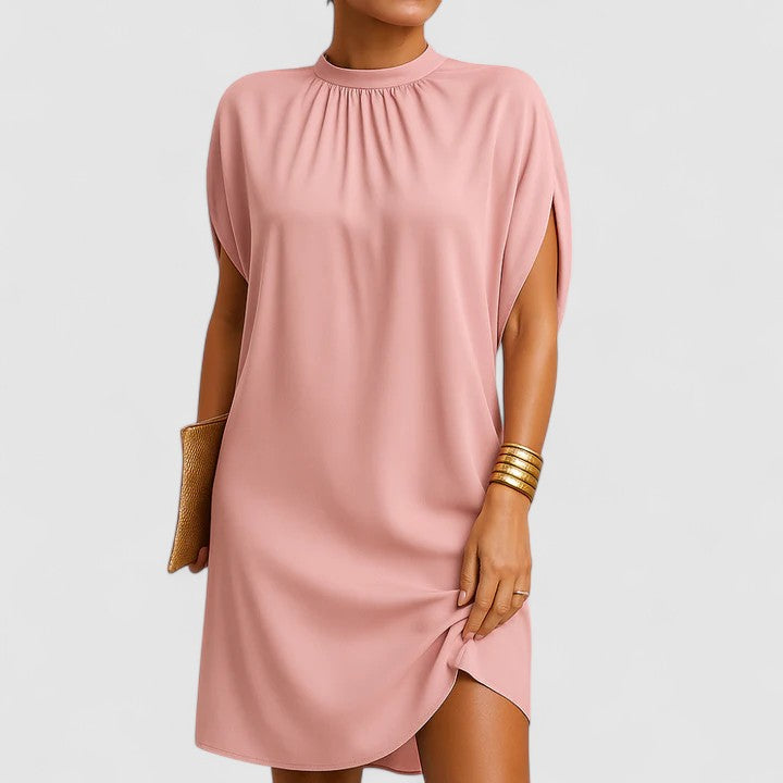 Elegant women's mini dress with chic shoulder cutouts, perfect for parties & dinner dates. Flattering fit.