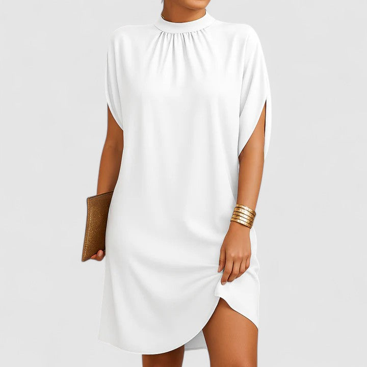 Pink women's elegant mini dress with stylish shoulder cutouts. Versatile for summer parties or dinner.
