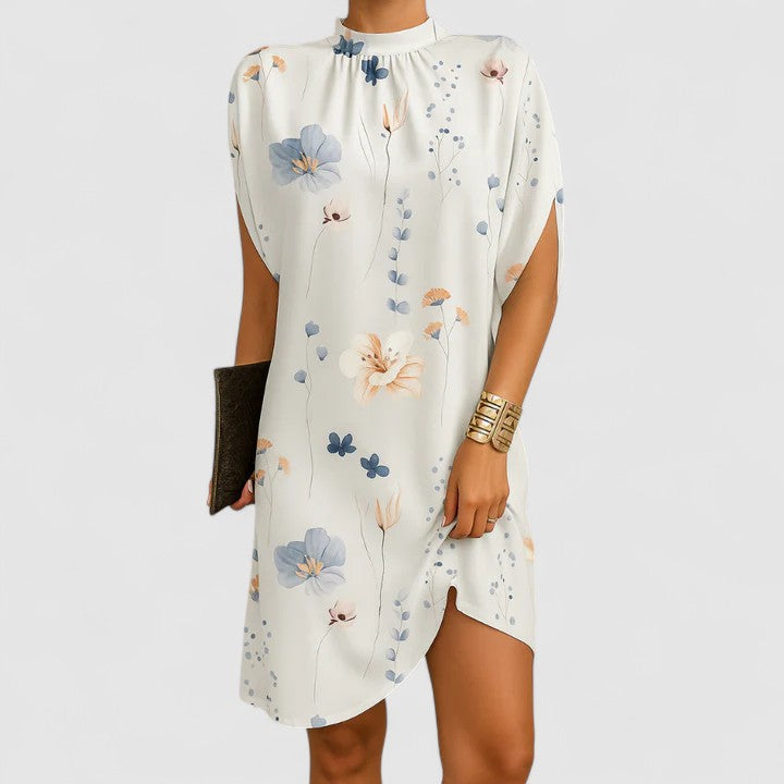 Floral women's mini dress, elegant & chic with shoulder cutouts. Ideal for summer or party wear.