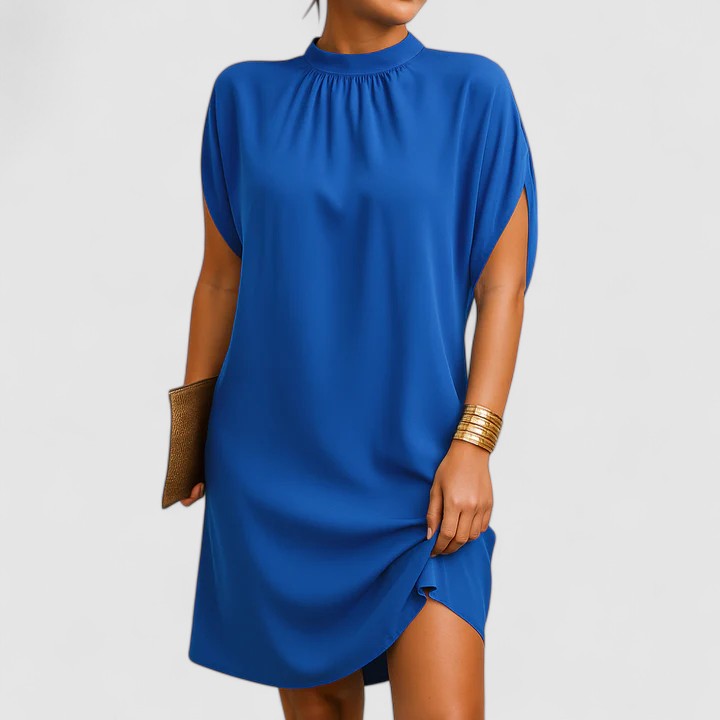 Flattering beige women's elegant mini dress featuring chic shoulder cutouts. Great for a sophisticated look.