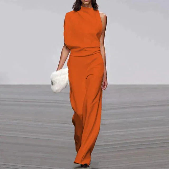 Elegant women's mock-neck wide-leg jumpsuit, perfect for formal occasions & evening wear. Sleeveless and chic.