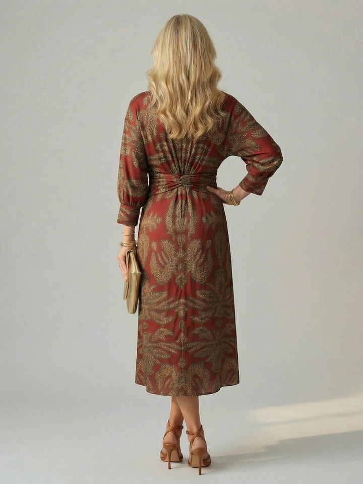 Modern women's long sleeve midi wrap dress, elegant and flattering for versatile casual or formal looks.