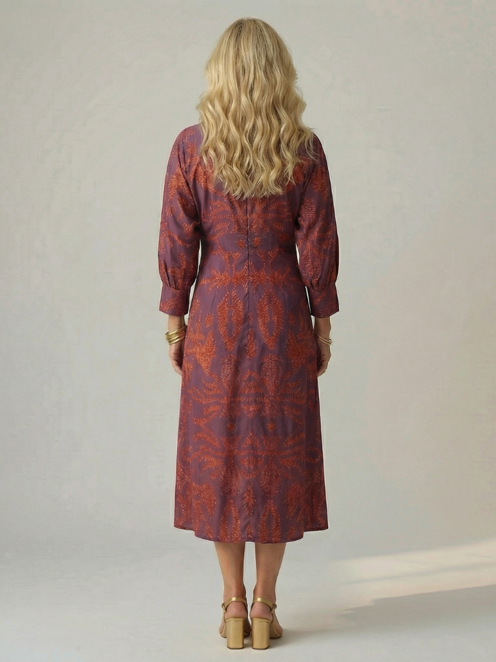 Day-to-night women's long sleeve wrap midi dress, elegant and versatile for seamless style transitions.