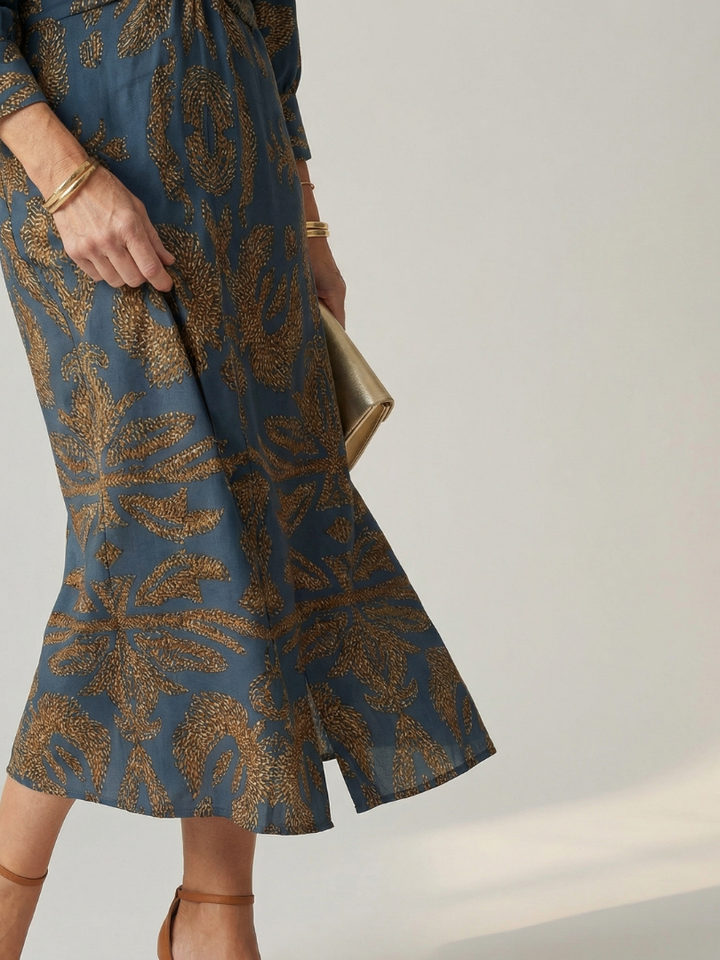 Women's flattering wrap midi dress with long sleeves, perfect for a chic and comfortable look.