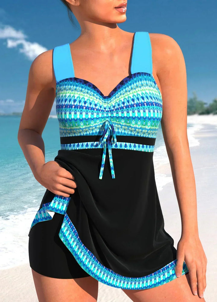 Supportive fit women's nautical one-piece swimsuit, ideal for summer beachwear & pool fashion during vacation. Elegant style.