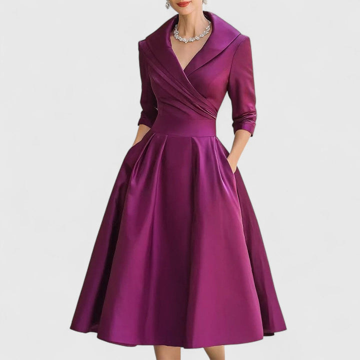 Stylish beige midi dress for women, showcasing a flattering V-neck, 3/4 sleeves, and a comfortable design.