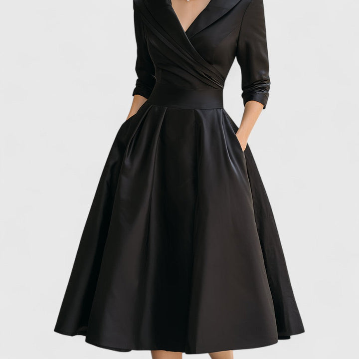 Versatile women's midi dress in a flattering V-neck style with 3/4 sleeves, suitable for casual or party events.