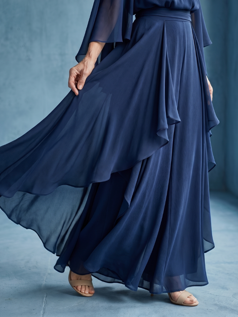Versatile navy midi dress for women, with elegant layered sleeves and a drape waist, suitable for formal or casual.
