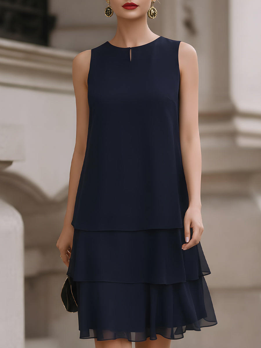 Elegant women's navy sleeveless tiered shift dress, perfect for sophisticated summer occasion wear and versatile fashion.
