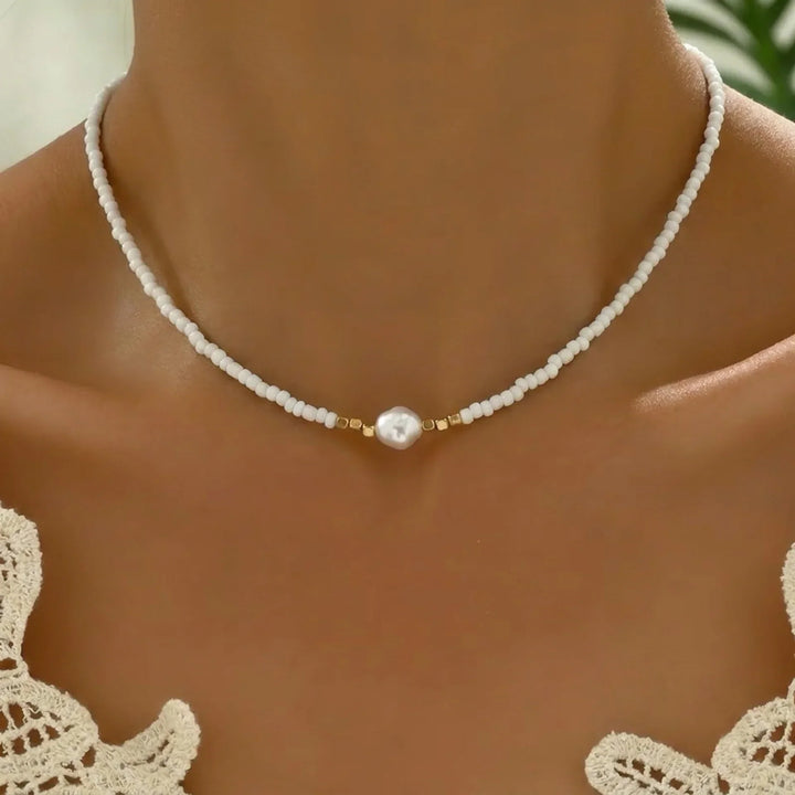 Adjustable pearl and turquoise necklace, an elegant accessory for women's fashion and jewelry collection.