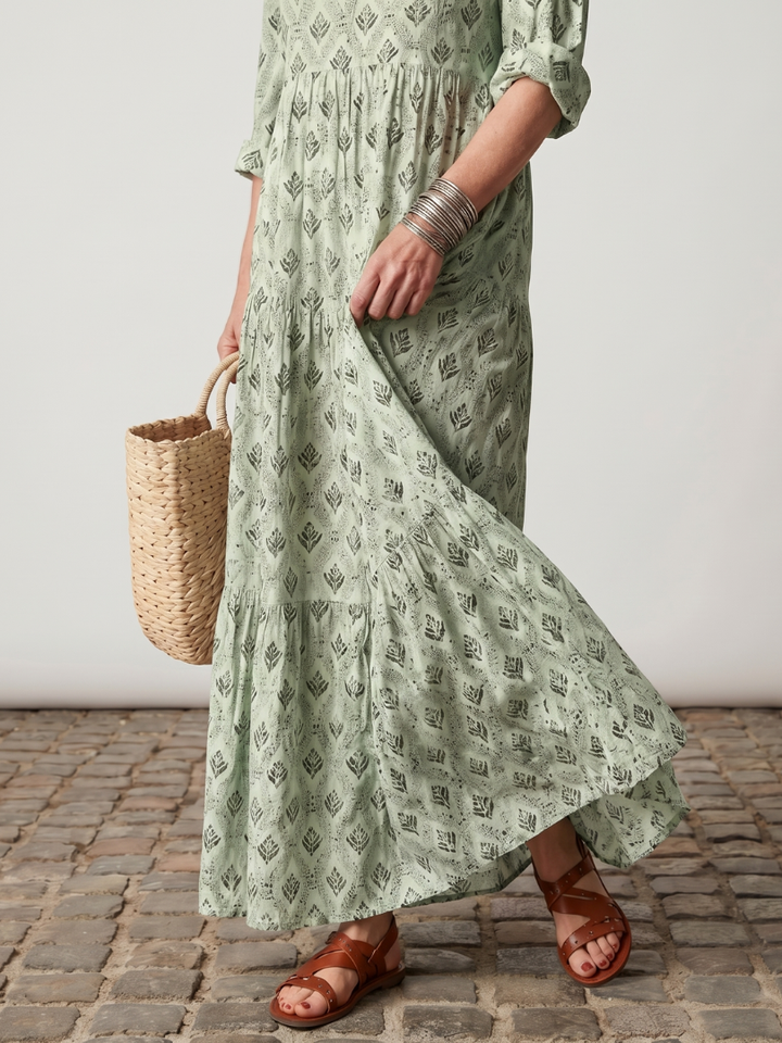 Women's fashion: Relaxed fit elegant maxi dress with a unique notch neck & vibrant floral long sleeves.
