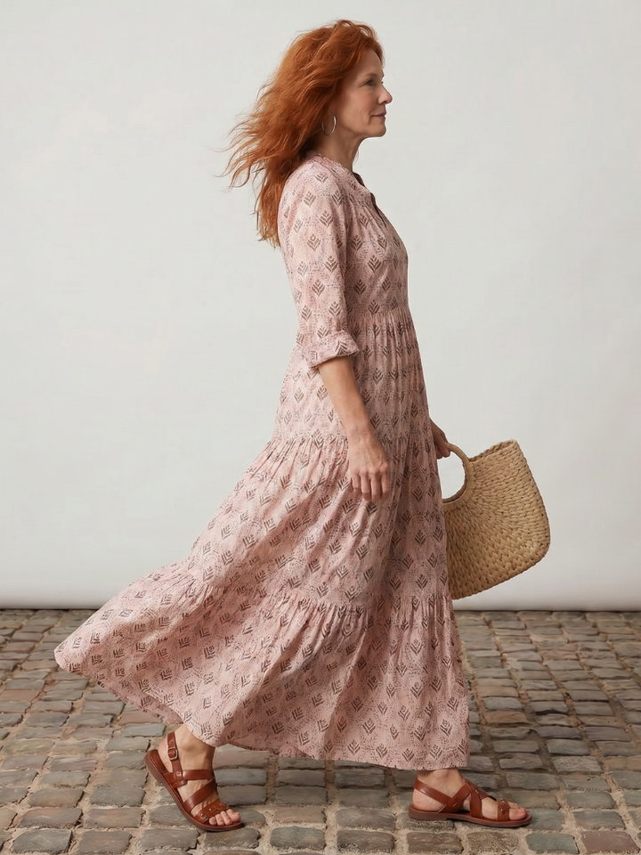 Relaxed fit women's elegant maxi dress, featuring a chic notch neck and all-over floral pattern.
