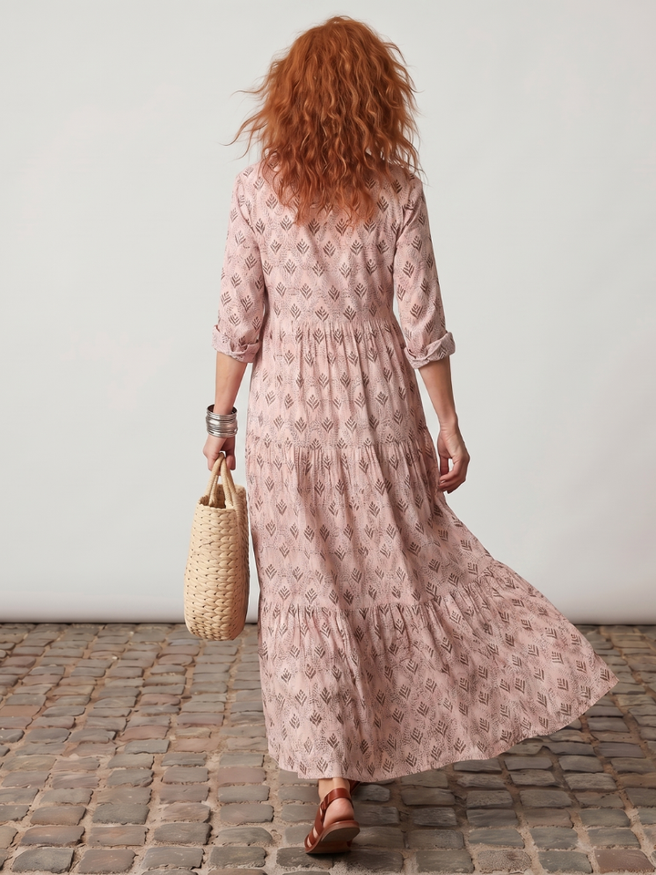 Women's elegant long sleeve maxi dress. Casual floral print and flattering notch neck for everyday style.