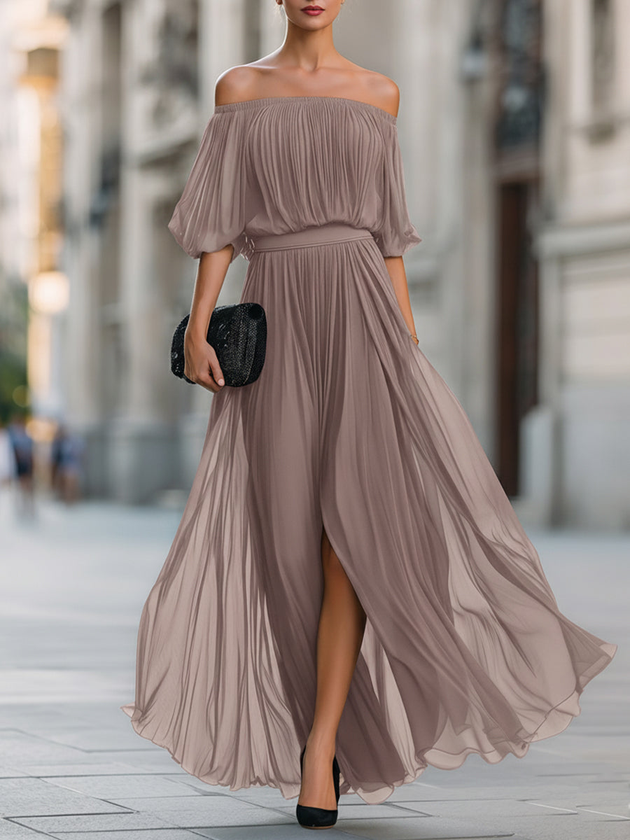 Close-up of a women's off-shoulder maxi dress, highlighting the elegant pleats and balloon sleeves.