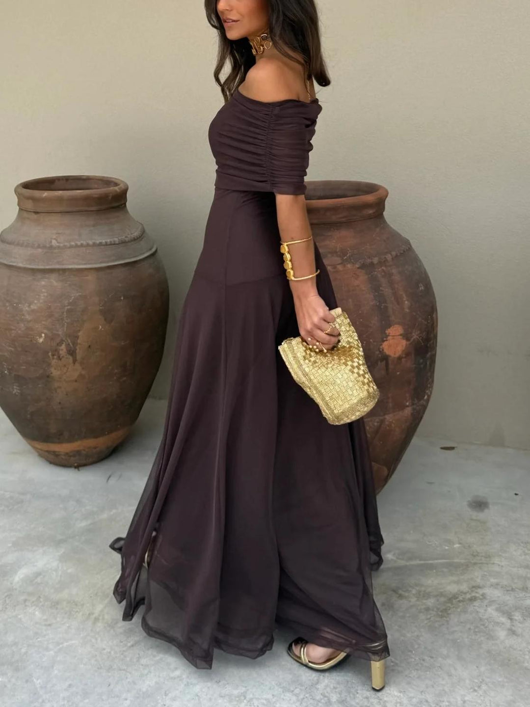 Flowing off-shoulder brown maxi dress with romantic style, ideal for women's evening garden parties and elegant occasions.