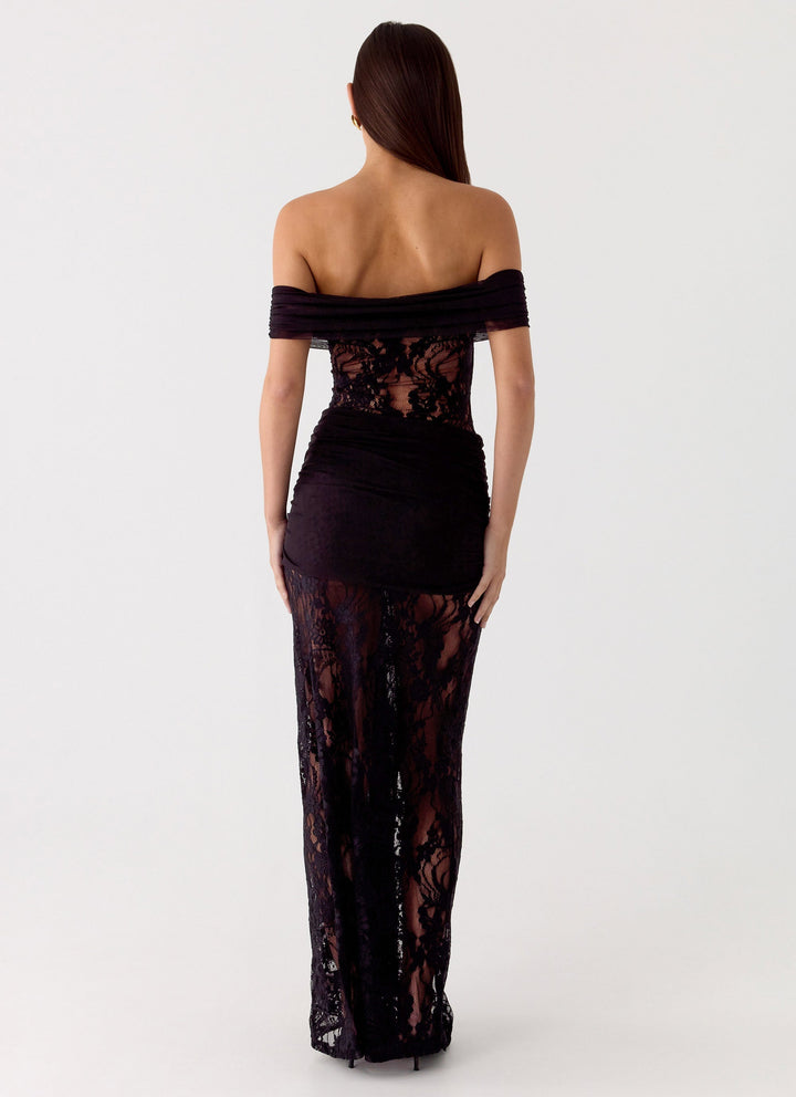 Model wearing an elegant women's off-shoulder maxi dress with lace, suitable for a sophisticated party.