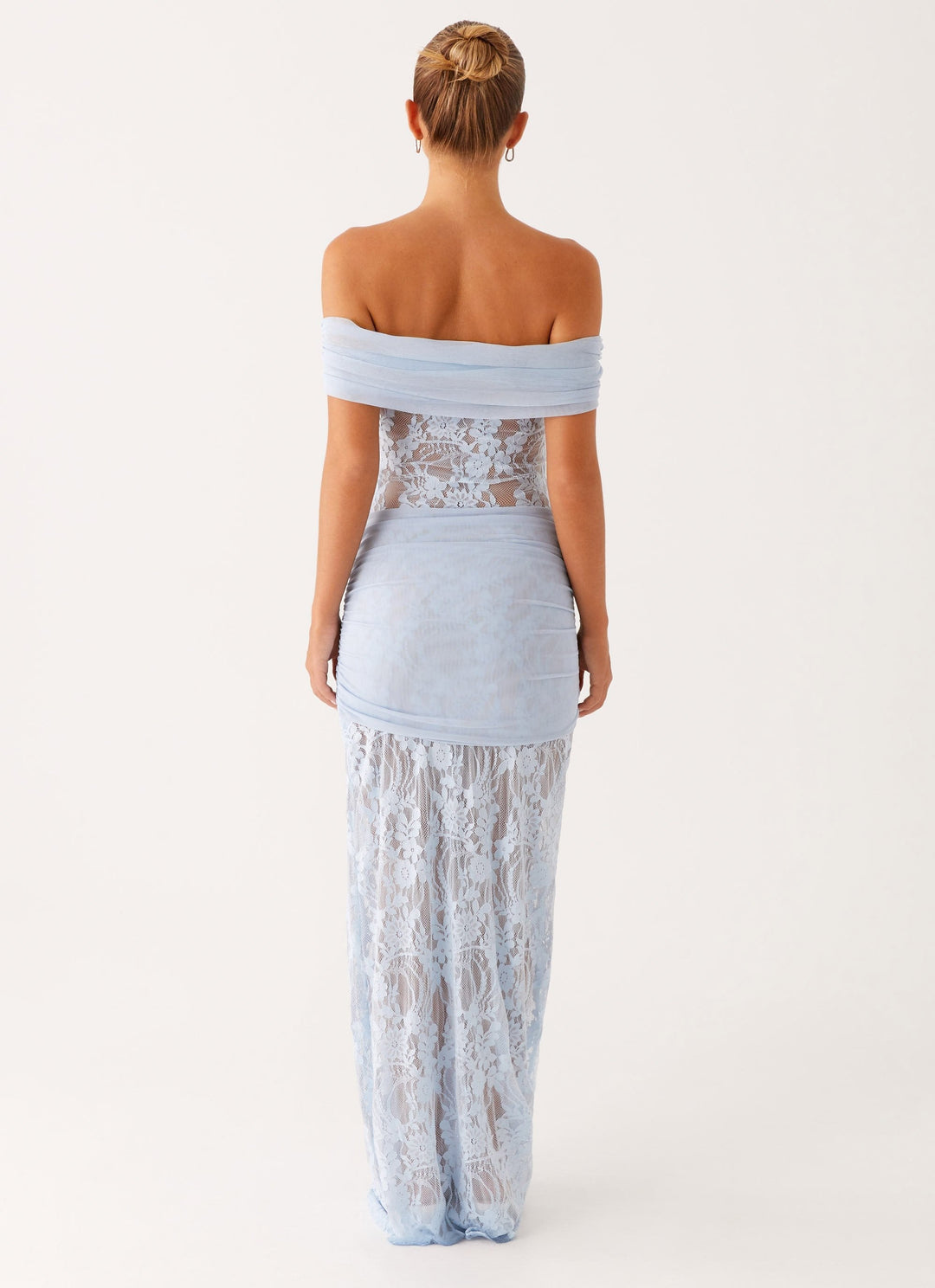 Women's formal maxi dress featuring exquisite lace details on the bodice and hem, off-shoulder design.