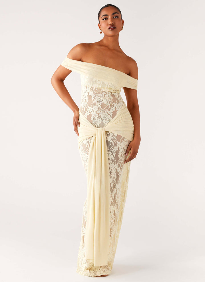 Flowy women's summer off-shoulder maxi dress with beautiful lace accents, comfortable and chic.