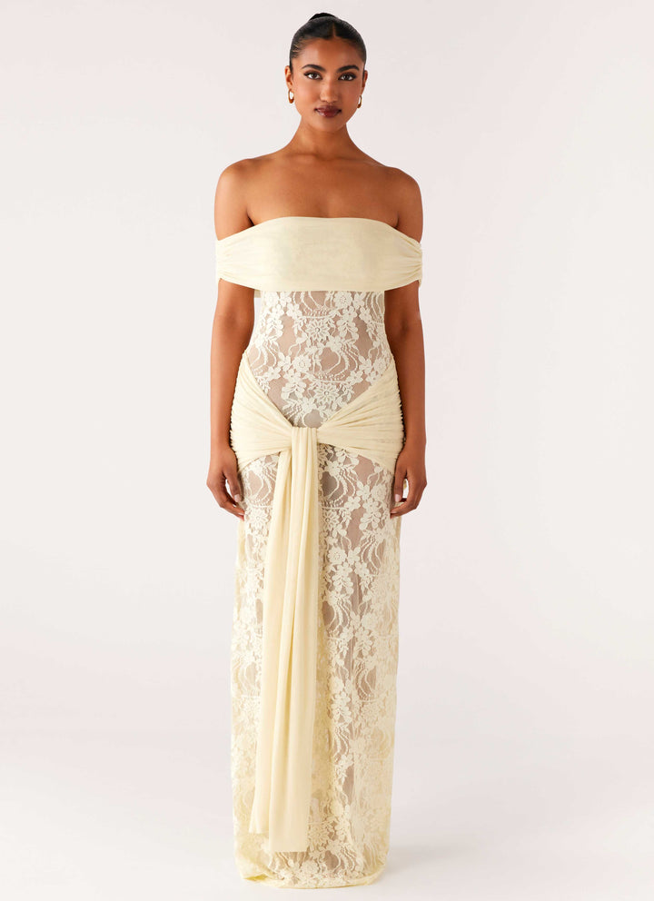 Front view of women's sophisticated off-shoulder maxi dress, highlighting lace details and floor-length design.