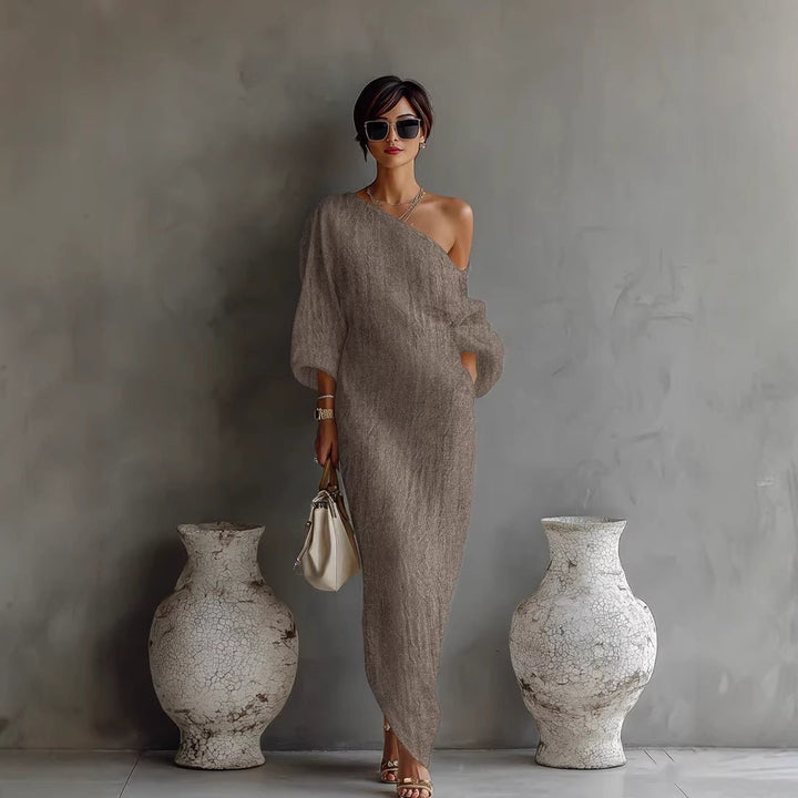 Elegant women's off-shoulder maxi dress with flowy lantern sleeves. Perfect for summer evenings & holiday wear.