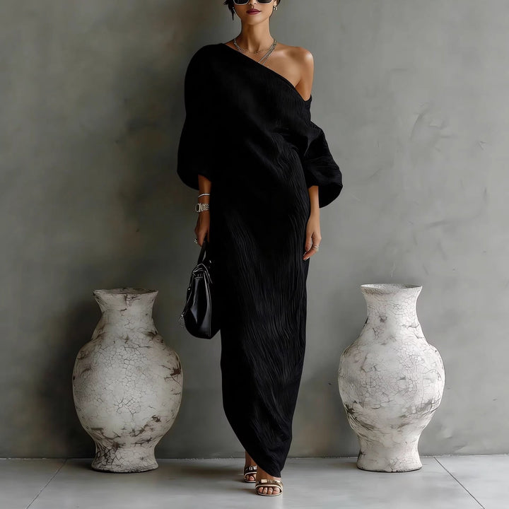 Flowy off-shoulder maxi dress for women, showcasing elegant lantern sleeves. Great for casual or evening wear.