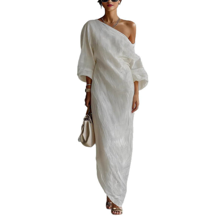 Chic off-shoulder maxi dress for women, featuring a flowy silhouette & elegant lantern sleeves. Summer fashion.