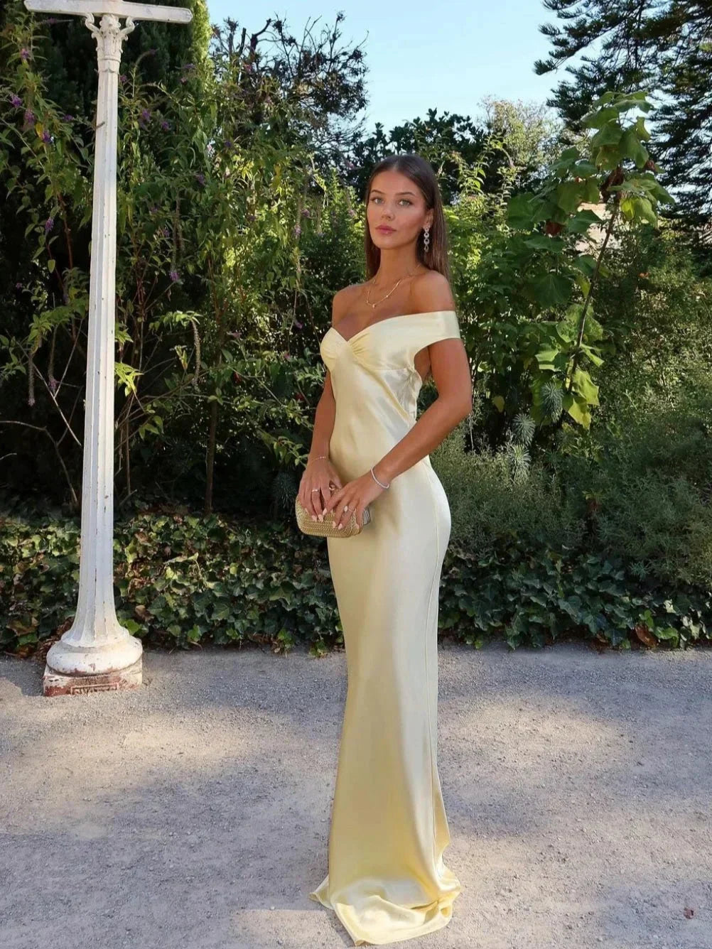 Elegant women's off-shoulder maxi evening dress, perfect for formal events & parties.