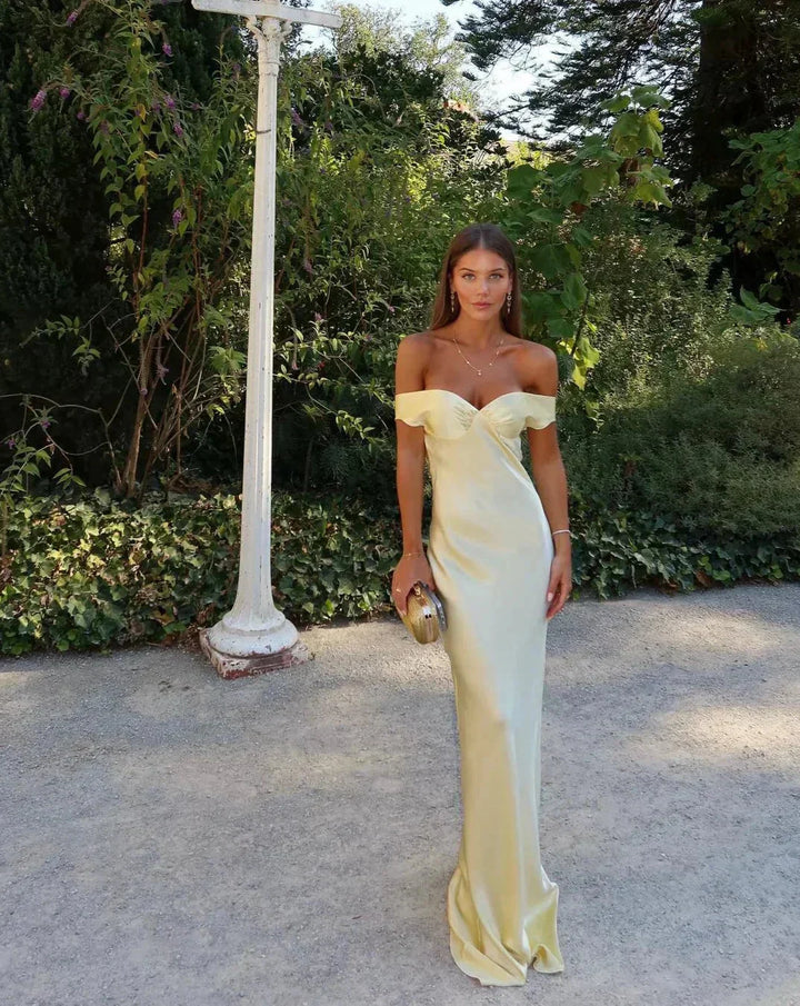 Stylish women's off-shoulder maxi dress for evening, wedding guest, or special occasions.