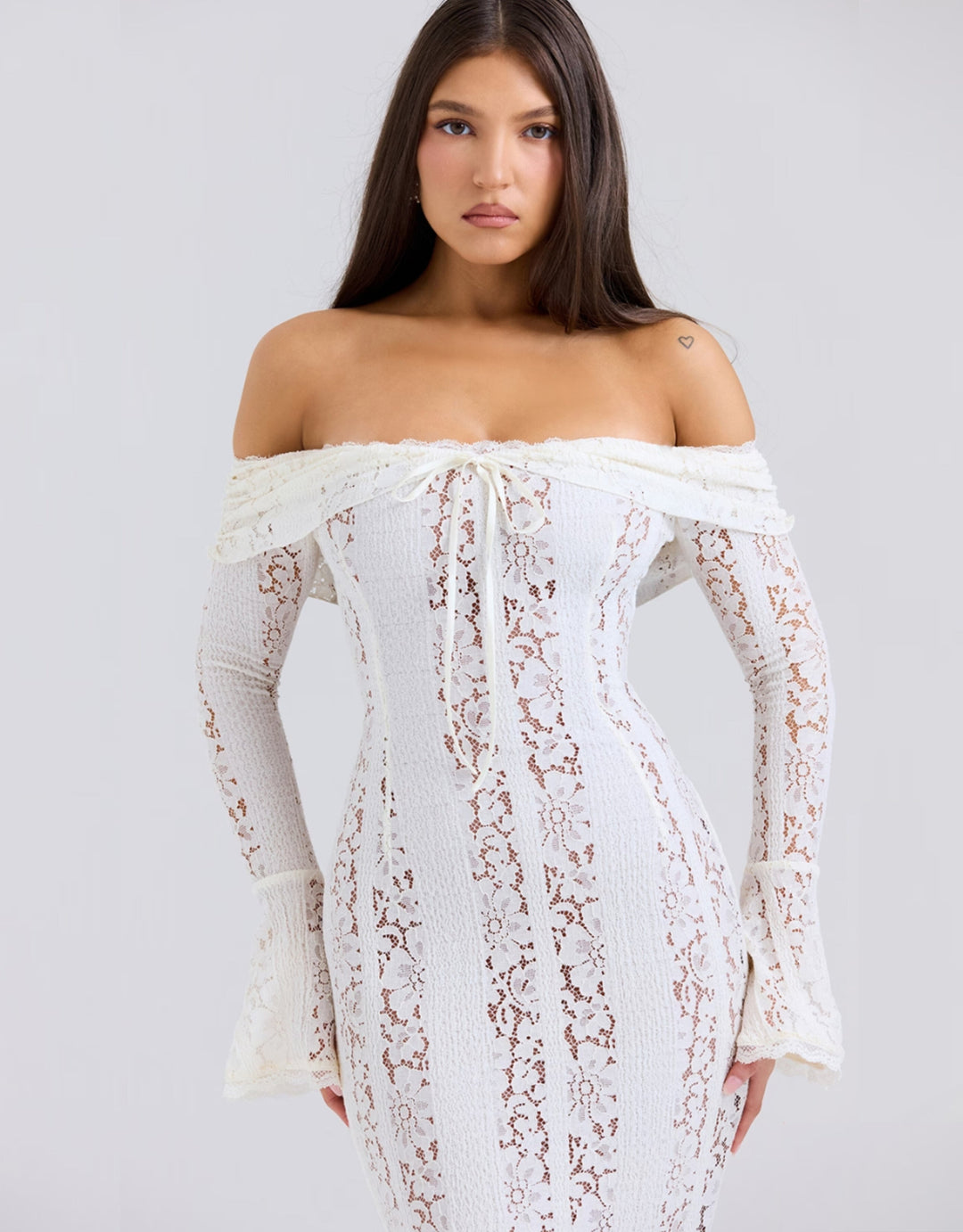 Stunning Off Shoulder Mermaid Wedding Gown for women. Elegant long bridal dress for formal events.