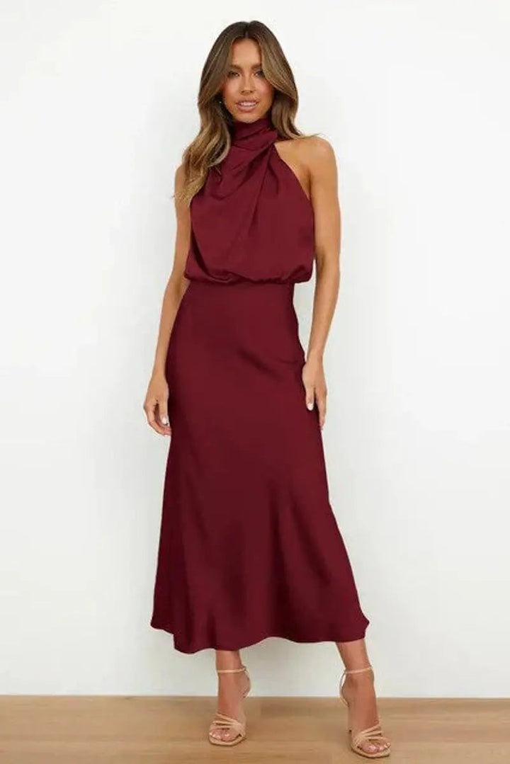 Beautiful off-shoulder party dress for women, a sleek and elegant midi length for evening events.