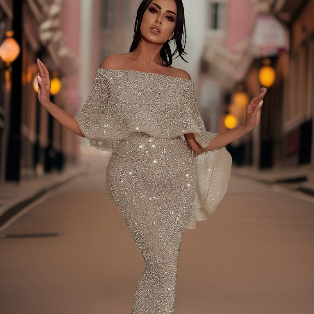 Sophisticated women's off-shoulder ruffle dress. An elegant day to night style, ideal as a party or cocktail dress.