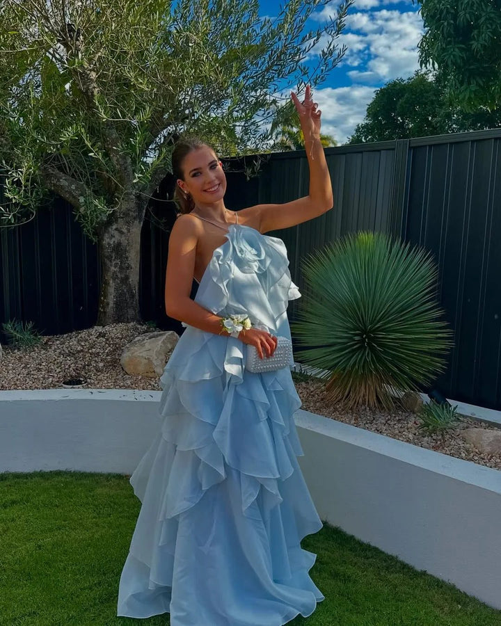 Sophisticated off-shoulder maxi dress with delicate ruffles, a stunning wedding guest dress.