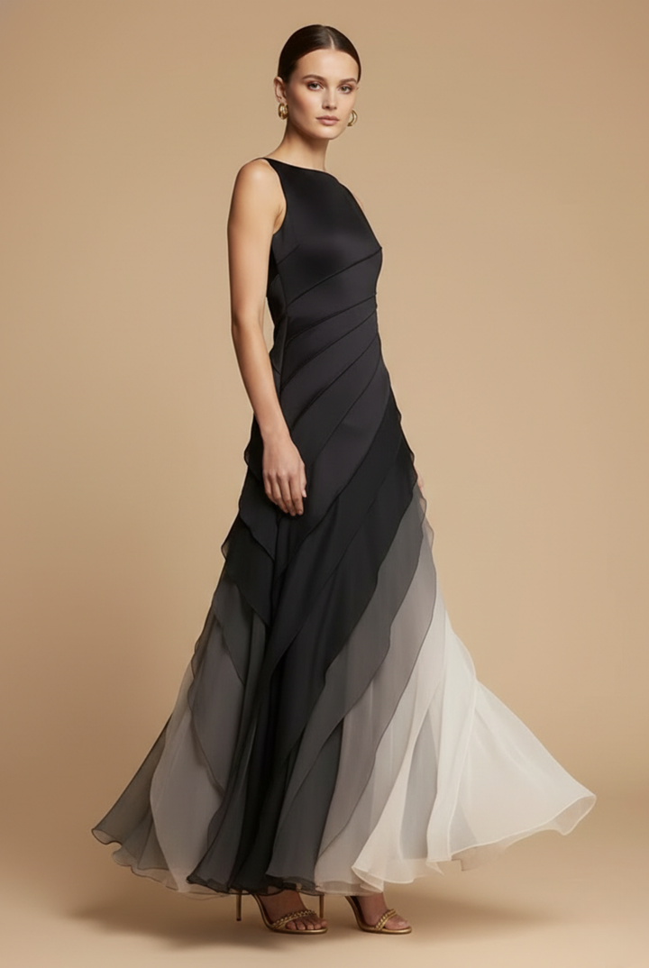 Sleeveless ombre tiered maxi dress with boat neck. Women's elegant black formal evening gown for special events.